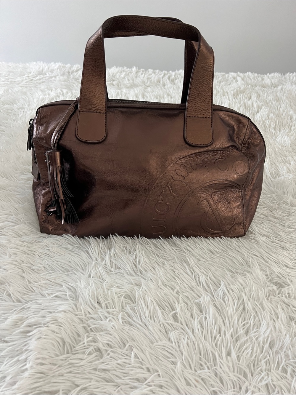 Juicy couture, leather handbag.